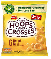 A yellow bag of Walkers Hoops and Crosses baked snacks, roast beef flavour. The front shows the product name, nutrition claims like "wholegrain goodness" and "30% less fat," and an image of X and O-shaped snacks. The packet contains 6 packs.