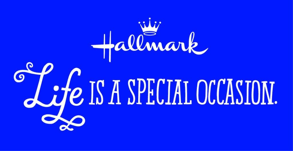 White Hallmark logo with a crown above the word "Hallmark" in script, followed by the phrase "Life is a special occasion." in decorative and bold serif fonts, all set against a solid bright blue background.