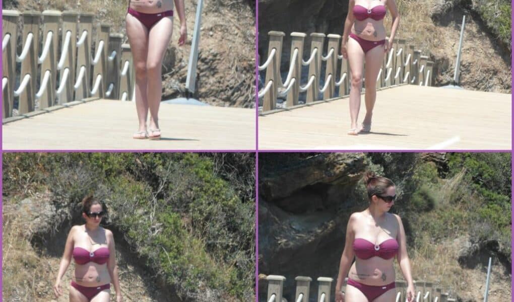 A woman wearing a mauve bikini and sunglasses walks barefoot on a wooden jetty surrounded by rocky cliffs and greenery. The image is a four-photo collage showing her in various walking poses under bright sunlight.