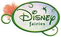 The Disney Fairies logo features the word “Disney” in green script inside a green oval with a pink flower on the left and a small flying fairy silhouette on the top right. Below, “fairies” is written in lowercase letters. The background is light and whimsical.