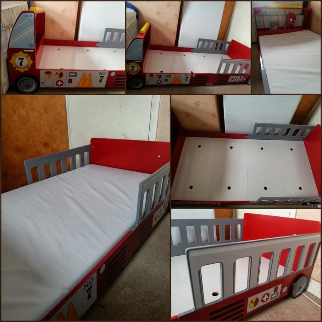 A red and grey children's bed shaped like a fire engine, shown from several angles. The headboard resembles the front of a lorry, with playful details like wheels and symbols. The mattress is fitted; some images show the bed's slatted, supportive base.