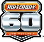 A metallic badge logo reads "Matchbox 60 Anniversary." "Matchbox" is in orange text within a yellow-bordered rectangle at the top. A large silver "60" is centred, and below it, an orange banner says "Anniversary" in white letters.