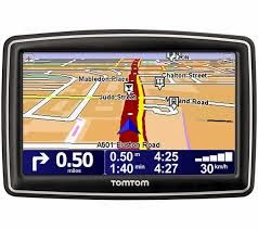 A TomTom sat nav display shows a navigation route on a map with a highlighted red path. Directions indicate a right turn in 0.5 miles. The screen displays arrival time, remaining time, distance, current road (A501 Euston Road), and speed limit (30 km/h).