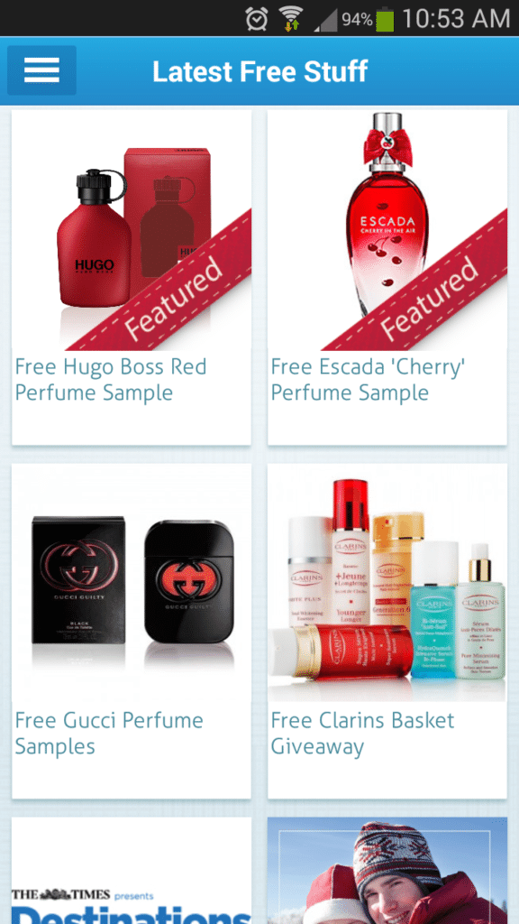 A smartphone screen displays a blue header reading "Latest Free Stuff." Below are images and labels for free perfume samples: Hugo Boss Red, Escada 'Cherry,' Gucci, and a Clarins skincare hamper giveaway. Two items have a “Featured” banner.