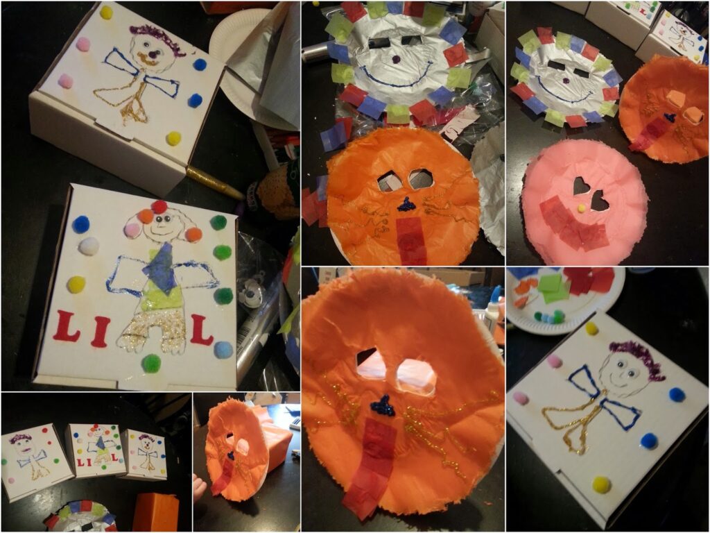 A collage of children’s crafts: colourful box lids decorated with stick-figure drawings, googly eyes, pom-poms, and the name “LIL”; and circular masks made from tissue paper, glitter, and small paper squares in various colours.