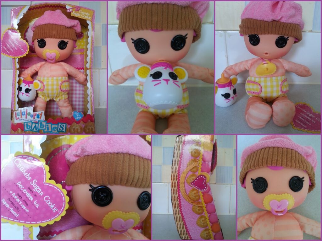 Collage showing a Lalaloopsy doll named Crumbs Sugar Cookie in and out of its box. The doll wears a pink hat, pink-yellow pyjamas, and holds a milk bottle with a mouse face. Close-ups include the doll’s button eyes, dummy, box side, and product label.