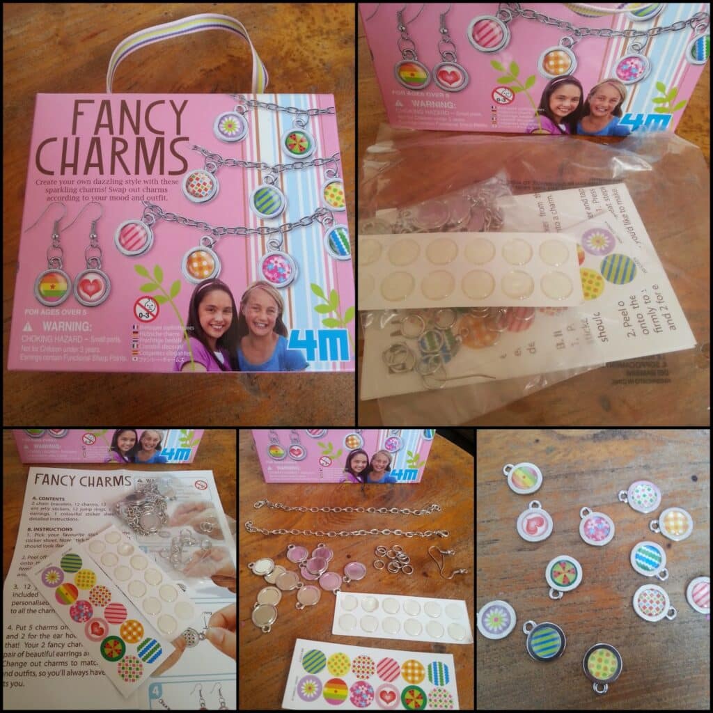 A collage shows a "Fancy Charms" craft kit with a pink box, instruction sheet, metal charm bases, stickers, gems, and chains displayed on a table, along with close-ups of the crafting materials and example finished charms with colourful patterns.