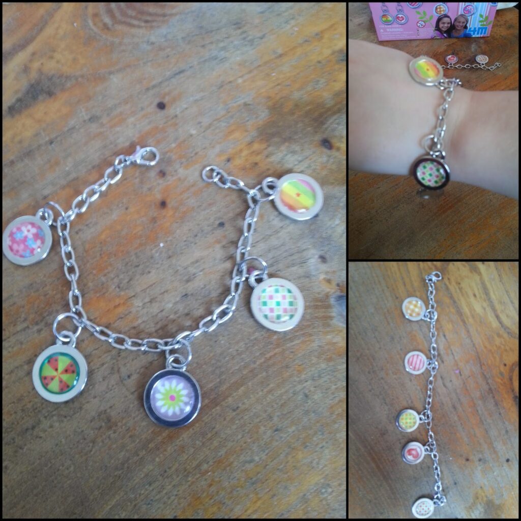A silver chain charm bracelet with five round, colourful dessert charms displayed on a wooden surface, shown alone, worn on a wrist, and laid vertically, highlighting the details of each dessert-themed charm.