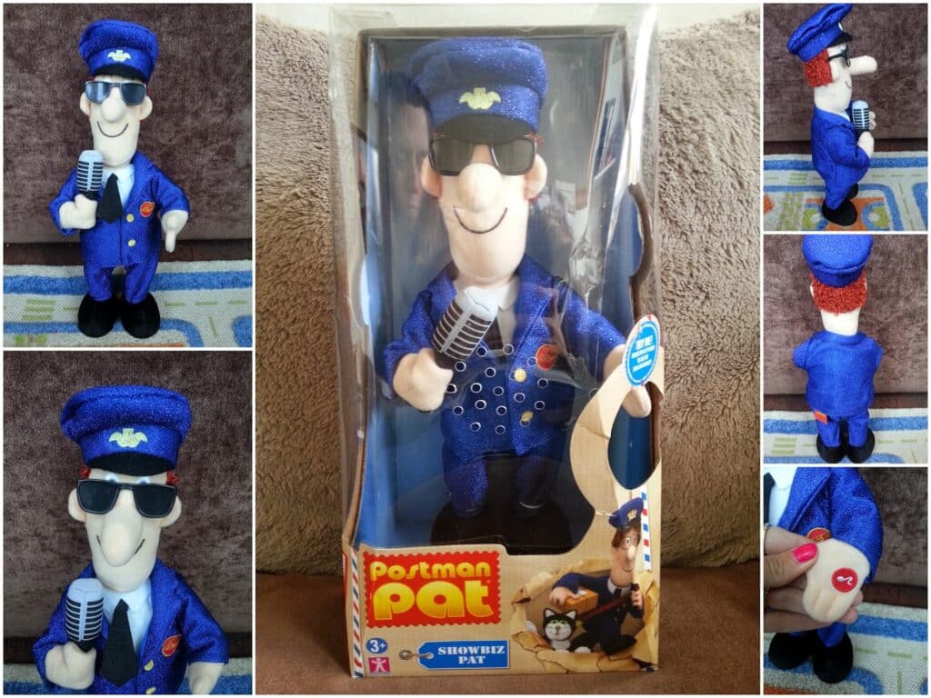 Plush toy of Postman Pat in a blue sequin suit, dark sunglasses, and cap, holding a microphone. The main photo shows the toy in its box labelled "Postman Pat Showbiz Pat." Other views show close-ups and side/back angles of the toy.