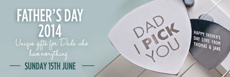 Banner for Father’s Day 2014 featuring two metallic guitar plectrums, one engraved with “DAD I PICK YOU” and the other with “HAPPY FATHER’S DAY LOVE FROM THOMAS & JANE.” The text promotes unique gifts for dads and highlights Sunday 15th June.