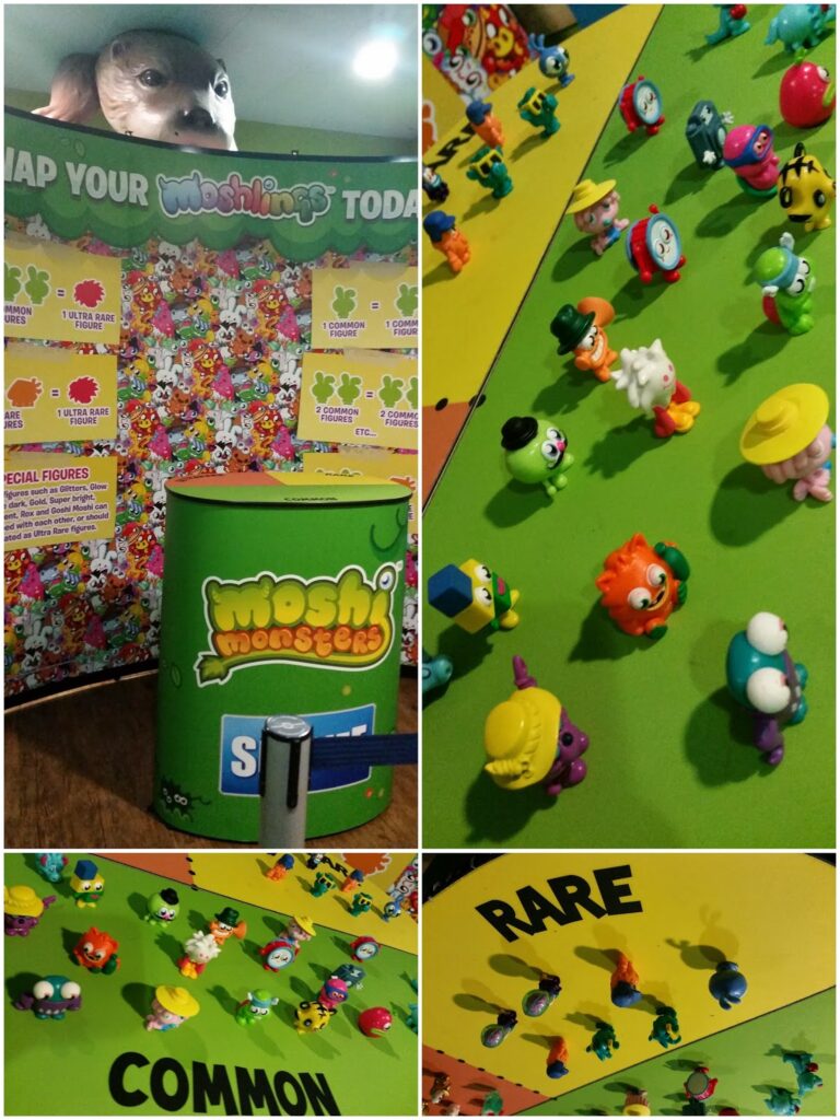 Collage showing a Moshi Monsters swap stall: wall with colourful posters and swap info, a green Moshi Monsters bin, and displays of Moshi Monsters toys arranged on a table by “COMMON” and “RARE” sections. Some toys wear hats; a mask hangs above.