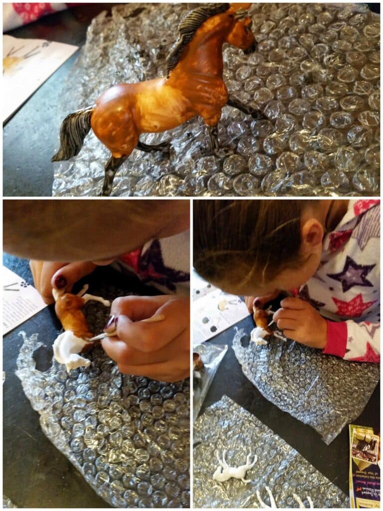 A collage shows a brown toy horse on bubble wrap (top), and a child in star pyjamas painting a white horse figurine (bottom left and right) while sitting at a table covered with bubble wrap and painting materials.
