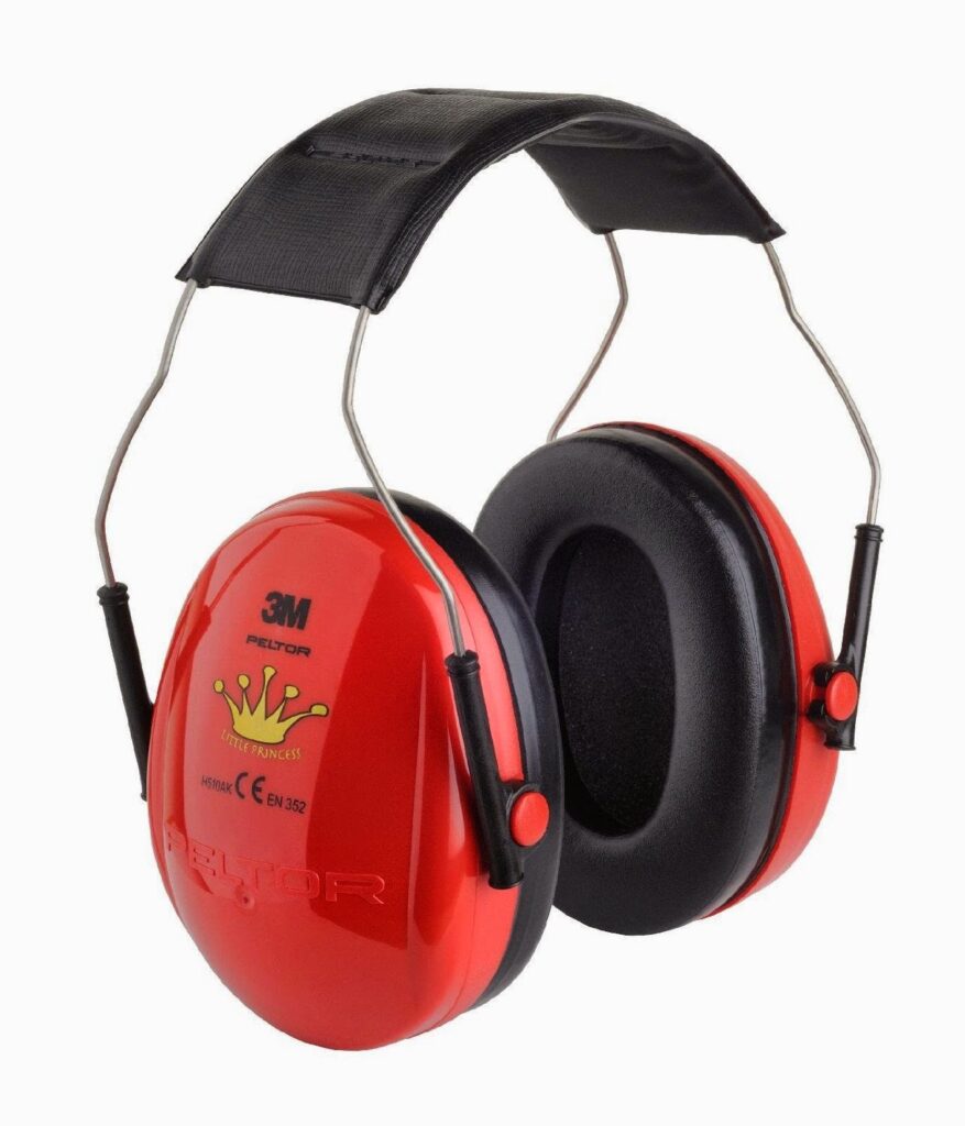 A pair of 3M Peltor red ear muffs with black cushioned ear pads and a black padded headband. The ear cups feature a yellow crown graphic and safety certification markings. The design is over-ear and intended for hearing protection.