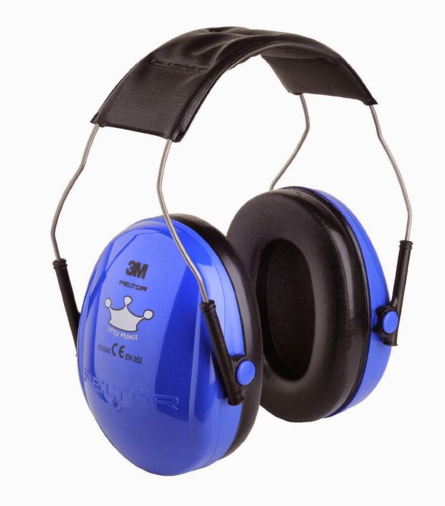 A pair of 3M Peltor blue ear defenders with black cushioned ear pads and a wide, padded black headband. The ear defenders have metal adjustable arms, and white text with diagrams on the outer shell, indicating hearing protection equipment.
