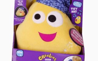 A yellow stuffed toy in a box.
