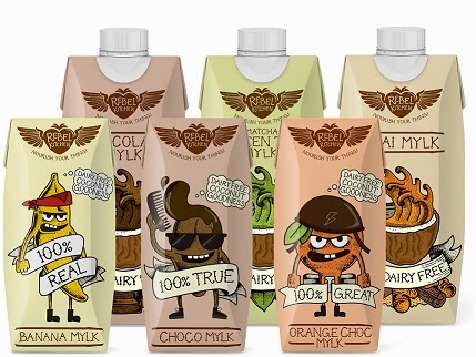Five cartons of plant-based milk by Rebel Kitchen are shown. Each features cartoon characters: a banana, chocolate square, orange, chai cup, and matcha cup, with phrases like “100% Real” and “Dairy Free” on beige, brown, orange, and green packaging.