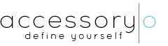 The image shows the logo for "accessory define yourself." The word "accessory" is in thin black lowercase letters, ending with a vertical black line and a light blue circle. Below, "define yourself" is written in smaller black letters.