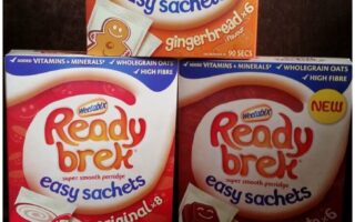 Three boxes of Ready Brek easy sachets porridge are shown: gingerbread flavour (orange box, top), original flavour (red box, bottom left), and chocolate flavour (red box, bottom right), all featuring porridge bowl images on the front.