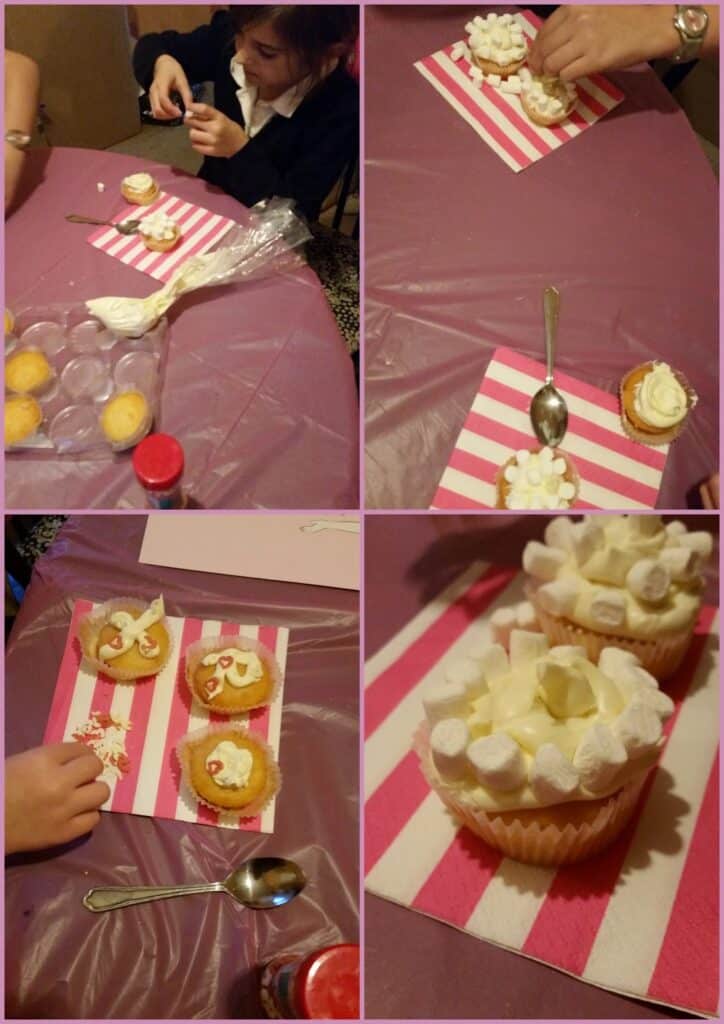 A collage of four photos shows children decorating cupcakes with white icing and mini marshmallows on striped serviettes at a purple table, using piping bags, spoons, and sprinkles. Finished cupcakes are topped with fluffy white decorations.