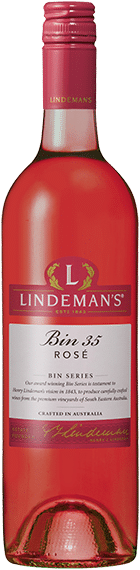 A tall, clear bottle of Lindeman’s Bin 35 Rosé wine with a pink screw cap. The label is white and pink with gold and burgundy details, featuring the Lindeman’s logo, wine name, and description. The rosé wine inside is a vibrant pink.