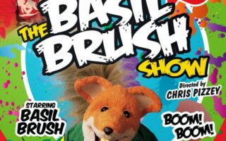 Colourful poster for “The Basil Brush Show” with photos of Chris Pizzey (smiling, wearing red) at the top left and Basil Brush (a puppet fox) at the bottom. Text promotes a 2015 tour and invites fans to meet Basil and Mr Stephen after the show.