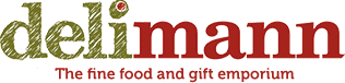 Logo for Delimann. The word “deli” is in a textured olive-green font with a red dot over the “i.” “Mann” is in a bold red font. Below, in smaller red text: “The fine food and gift emporium.” Background is light grey.