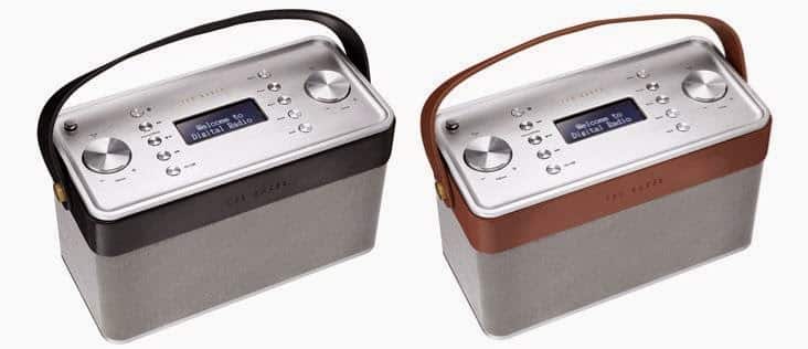 Two retro-style portable radios with digital displays and control buttons are shown. One has a black handle and trim, the other has a brown handle and trim; both have a silver and grey body with a modern rectangular design.