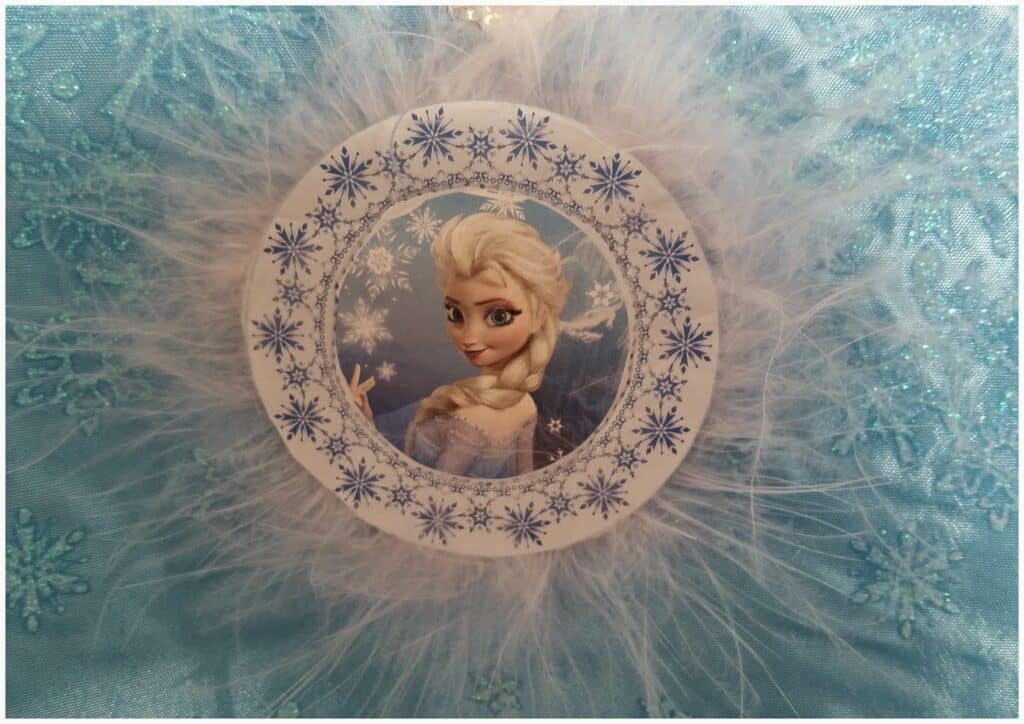 A frozen cartoon on a blue fabric.