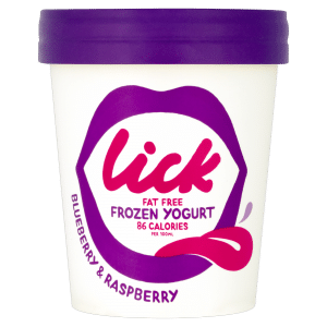 A white tub of Lick fat free frozen yoghurt with a purple lid. The label features purple lips, the word "lick" in bold pink, and text stating "Frozen Yoghurt, 86 calories per 100ml." The flavour, Blueberry & Raspberry, is noted on the side in purple.