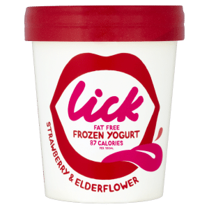 A white tub of Lick brand fat free frozen yoghurt with a red lid. The label features a red open mouth graphic and pink text reading "lick" and "frozen yoghurt." Flavour indicated is strawberry & elderflower, with 87 calories per 100ml.
