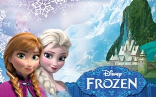 Anna and Elsa from Disney’s Frozen stand side by side, smiling, with snowflakes and icy mountains in the background. A castle sits atop a mountain, and the Disney Frozen logo appears in the lower right corner. The scene has a magical, wintry feel.