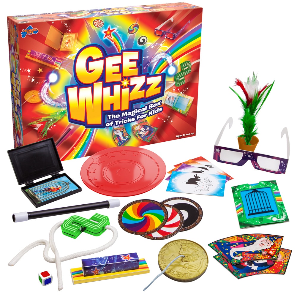 A colourful magic trick set called “Gee Whizz: The Magical Box of Tricks For Kids” is displayed. The box is bright with rainbows and stars. Various magic props are arranged in front: cards, rings, rope, wand, glasses, coins, and other playful accessories.