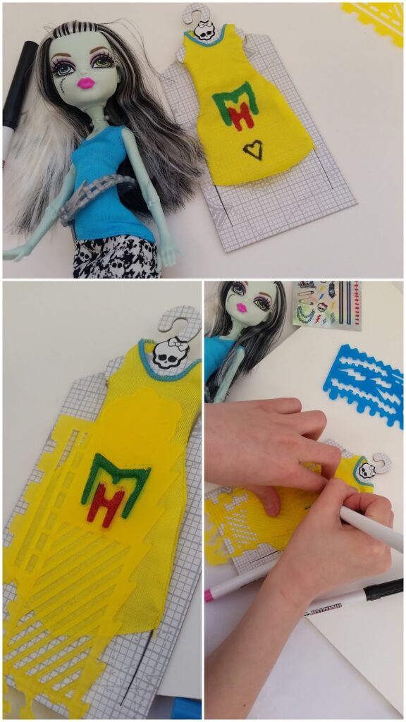 A doll with green skin and long black-and-white hair lies next to a yellow dress with “MH” and a heart drawn on it. Two close-ups below show hands outlining the dress on a template with stencils and markers. Craft supplies are nearby.