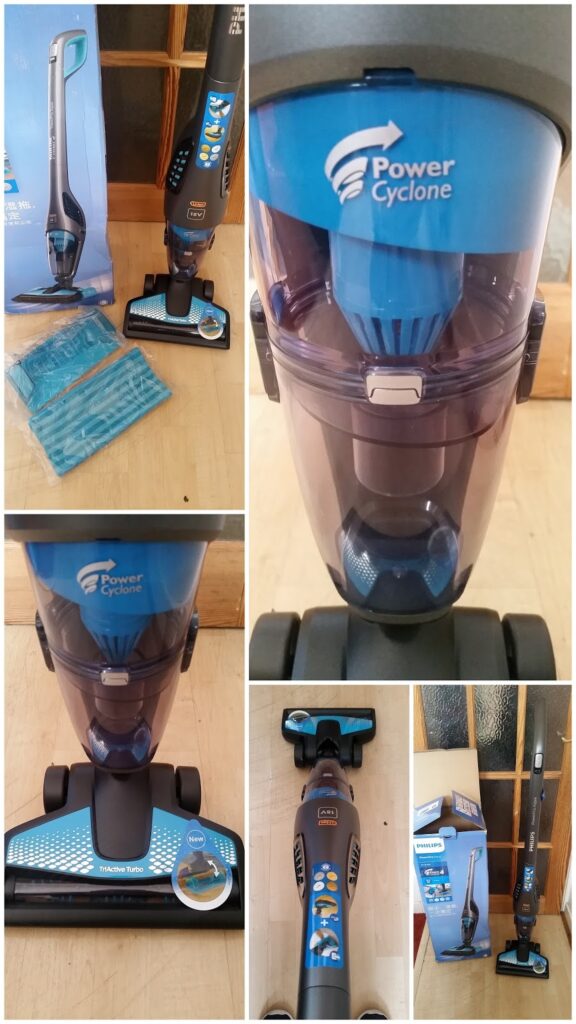 A collage shows a blue Power Cyclone vacuum from various angles, including close-ups of its dust container, brush head, and controls. The vacuum stands on a wooden floor beside its box, manual, and several blue filter pads.