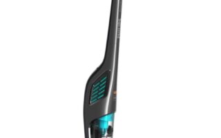 A modern upright stick vacuum cleaner with a sleek black and teal design stands upright on a white background. The vacuum has a transparent dustbin and brush head, with teal accents on the handle, dustbin, and base.