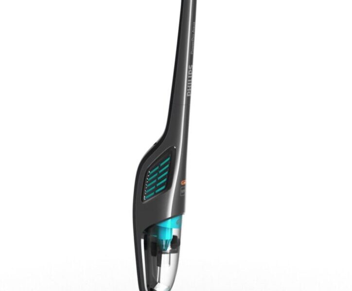 A modern upright stick vacuum cleaner with a sleek black and teal design stands upright on a white background. The vacuum has a transparent dustbin and brush head, with teal accents on the handle, dustbin, and base.