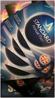 A close-up photo of several blue Merlin Standard Annual Pass cards, fanned out. Each card displays the Merlin logo, the text “Standard Annual Pass”, and a British flag symbol in a circle at the bottom right.