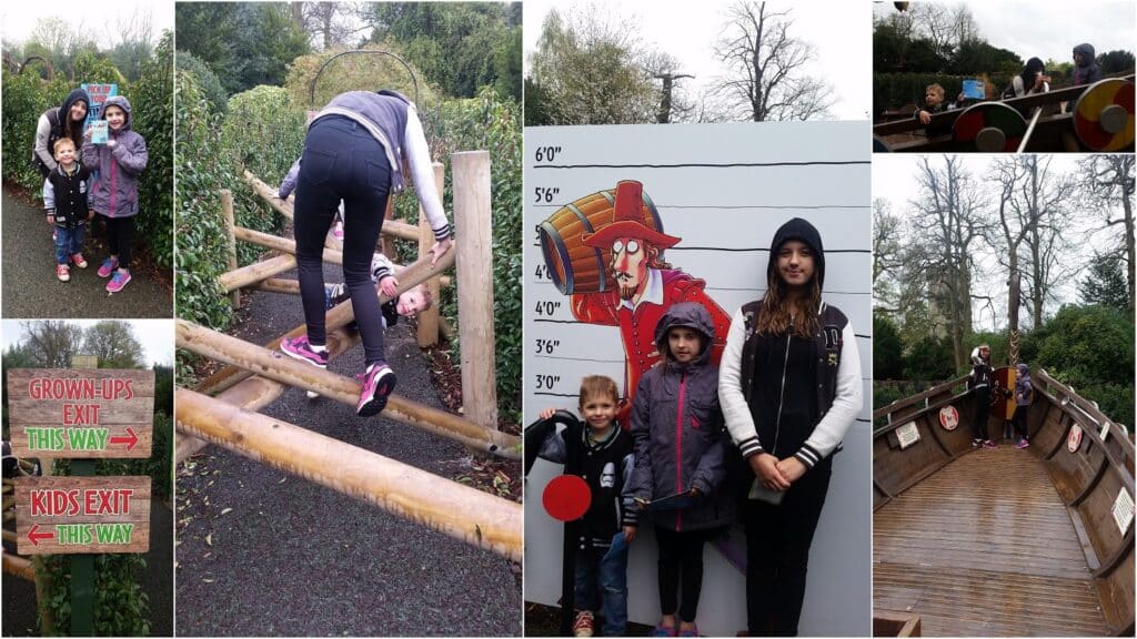A collage of seven outdoor photos shows children and adults at a park. Activities include posing by a height chart, balancing on wooden beams, standing on a wooden bridge, and smiling near signs for grown-up and kid exits. Trees and cloudy skies are in the background.