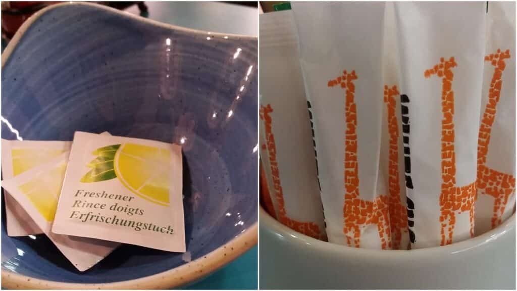 Split image: Left side shows a blue ceramic bowl holding lemon-themed freshener wipes. Right side displays white paper-wrapped straws in a cup, each with an orange giraffe illustration along the length of the wrapper.