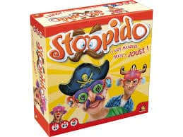 A colourful Stoopido board game box features cartoonish faces with silly glasses, hats, and noses. The logo is large and playful, with a pirate and viking character in the foreground, and bright yellow background with red and white accents.