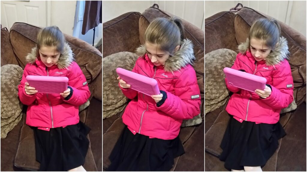 A young girl with light brown hair in a ponytail sits on a brown sofa, wearing a bright pink winter coat with a furry hood and a black skirt. She is focused on a pink tablet in her hands in three similar side-by-side images.