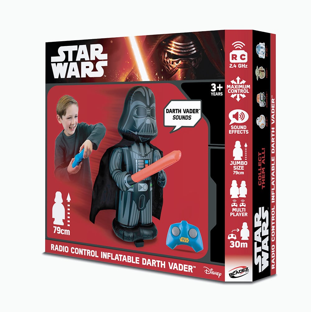 The image shows a Star Wars toy box featuring a remote control inflatable Darth Vader. A smiling boy plays with the toy using a blue remote. The box highlights features: Darth Vader sounds, jumbo size (79cm), 30m range, and 2.4 GHz control.