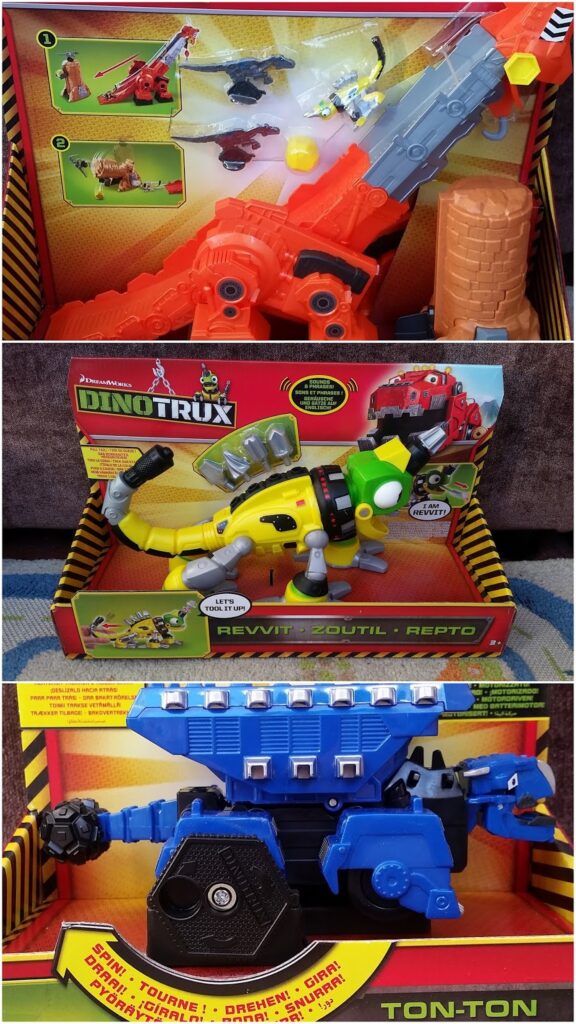 Three toy dinosaur-vehicle hybrids from the Dinotrux series are displayed in colourful open-front boxes. The top is red with a crane arm, the middle is yellow with green armour, and the bottom is blue with wheels and silver accents.