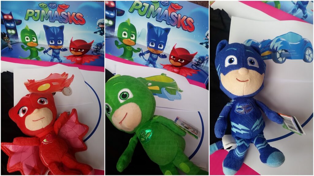 A collage of three photos featuring PJ Masks characters. Each panel shows a poster with Catboy, Gekko, and Owlette, and below it, a matching soft toy: Owlette with red wings, Gekko in green, and Catboy in blue, each holding their vehicle image.