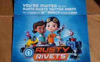 An invitation card on brown card features Rusty and Ruby, cartoon characters from "Rusty Rivets", with robot friends. The text invites to a Rusty Rivets Twitter Party on Thursday, 18th March at 4:30pm. The Nick Jr. logo is at the bottom right.