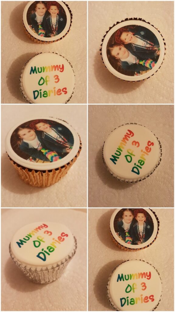 A collage of eight photos shows cupcakes with edible toppers. Some cupcakes display a photo of two smiling children, and others have colourful text reading “Mummy Of 3 Diaries.” All cupcakes are on a light, textured surface.