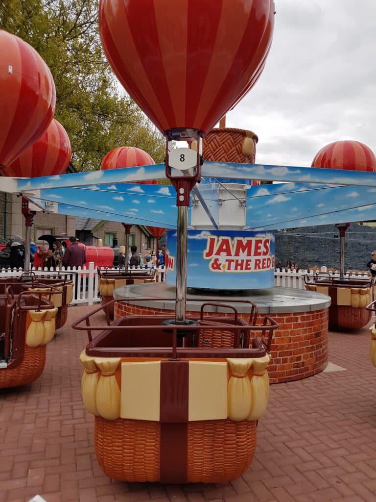 A ride with red balloons.