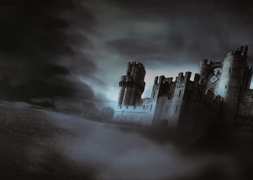 A large, old stone castle with multiple towers sits on a foggy, grassy hill under a dark, cloudy sky. The scene is dimly lit, creating a mysterious and eerie atmosphere.