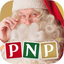 A man dressed as Father Christmas with white hair, a curly beard, and spectacles, holds his spectacles while looking forward. Three coloured blocks at the bottom display the letters "PNP" in red, green, and gold.