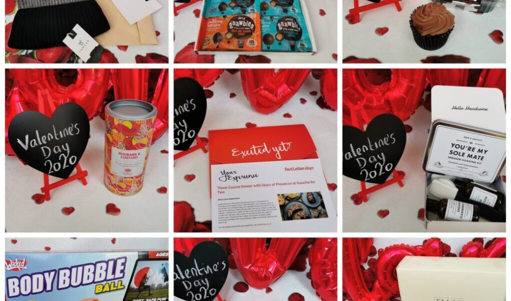A 3x3 grid shows Valentine’s Day 2020 gifts: beanie and card, snacks box, chocolate cupcake, Pringles tube, restaurant gift voucher, small chocolates box, body bubble ball toy, gummy sweets, and a black quilted handbag. Red heart balloons and rose petals decorate the scene.